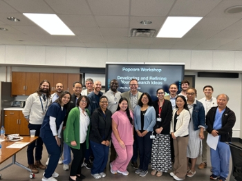 Dr. Wilson group photo with participants.